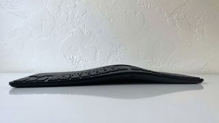 The HP 960 Ergonomic Keyboard seen from the top edge showing the central vertical slope