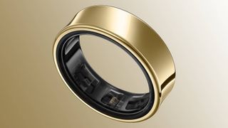 Samsung Galaxy Ring in gold color scheme against gold gradient background